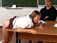 Innocent looking schoolgirl is bent over a desk and paddled to tears